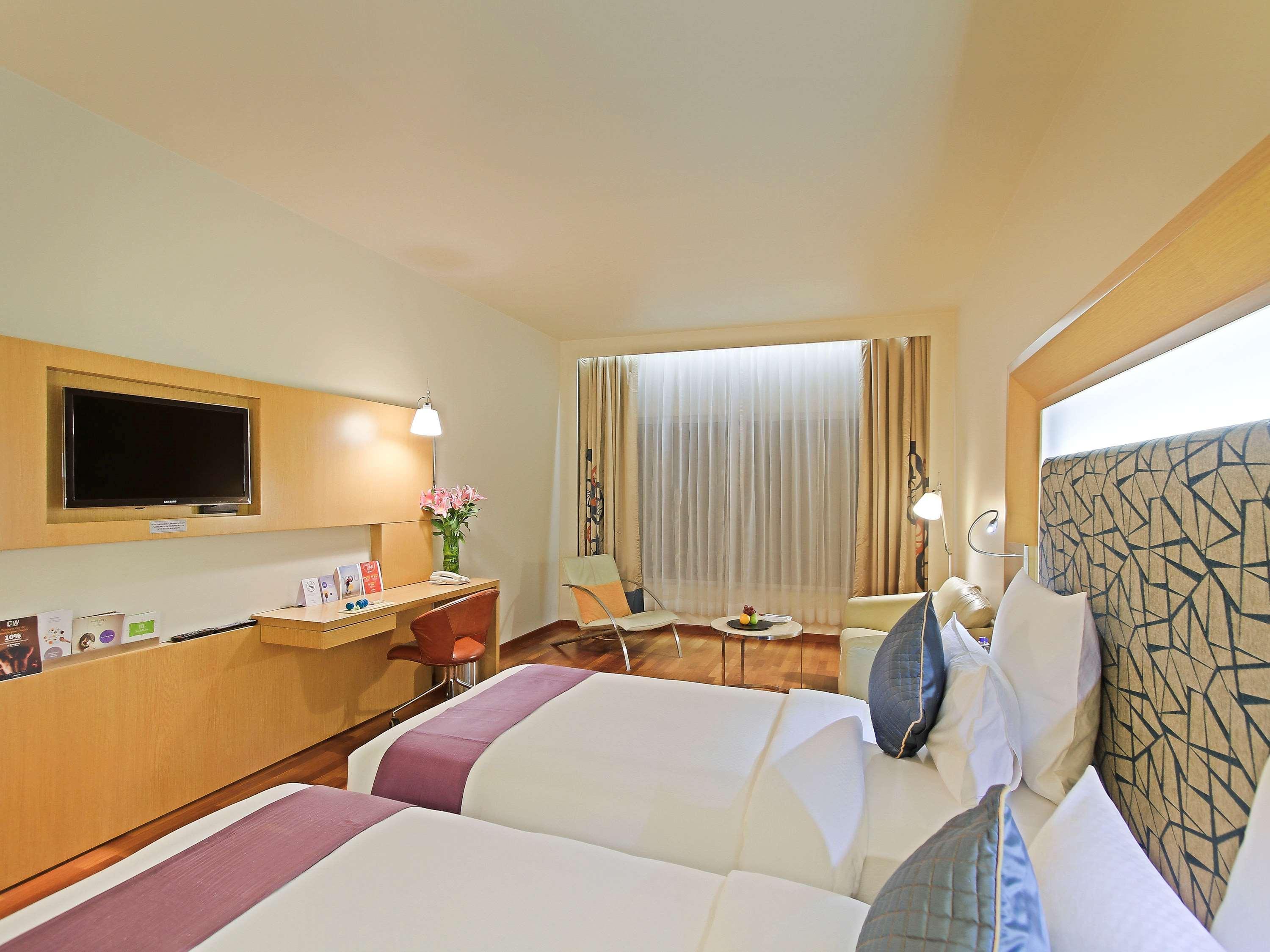 Novotel Visakhapatnam Varun Beach Экстерьер фото A room at the hotel